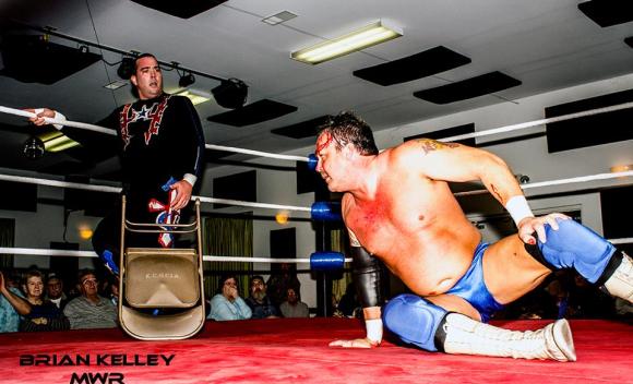 Ricky Cruz assaults Chaz Wesson with a chair on March 22 in East Carondelet.
