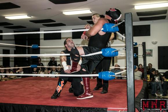 Ricky Cruz later walked out on this match with Red River Jack (right) on September 20.  Photo: Brian Kelley